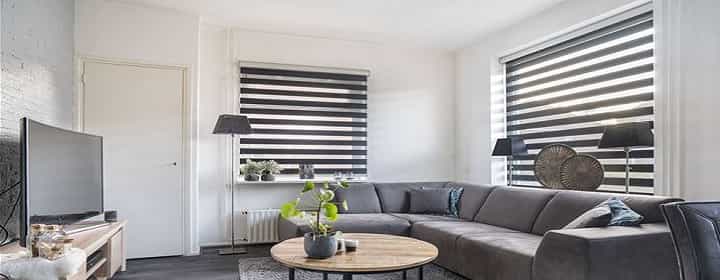 Zonwerende raambekleding: stijl, comfort en koelte in jouw huis